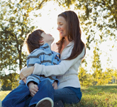 mother holding child